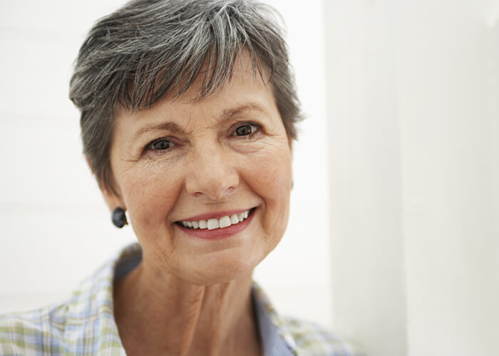 Close up of an older woman with a beautiful smile